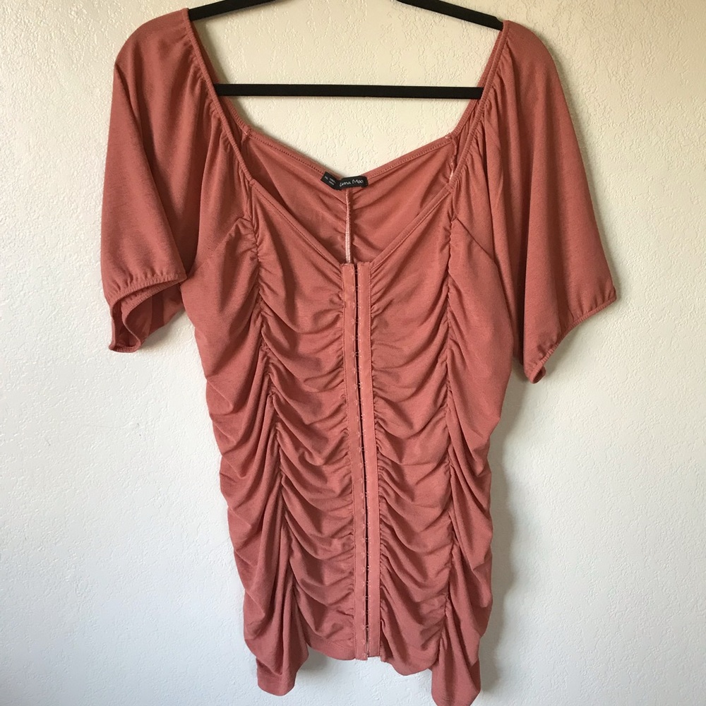 Fitted coral top with corset style detail